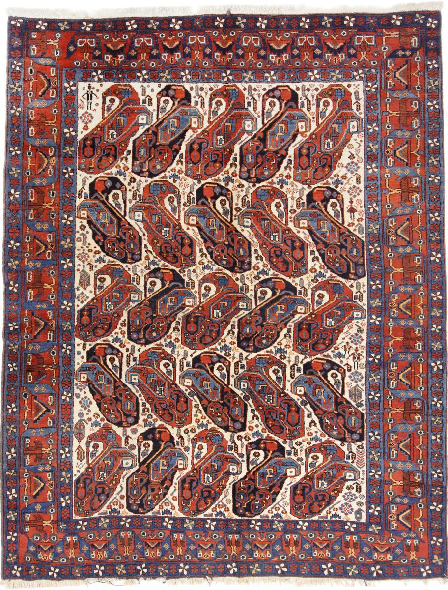 «Boteh» pattern in handwoven carpet