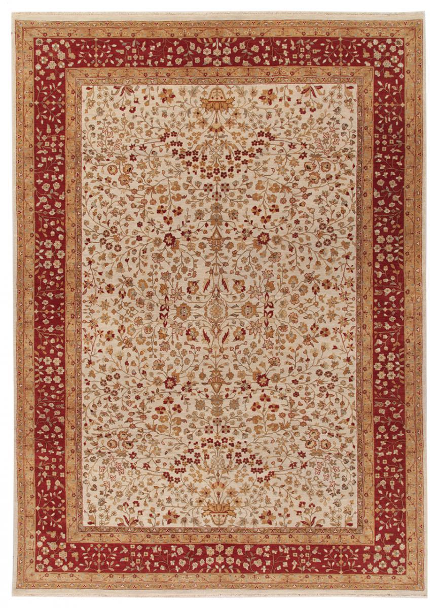 Handwoven carpet with silk background